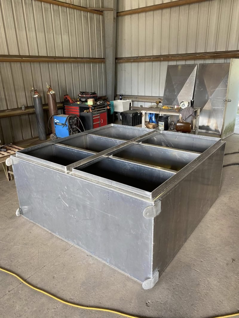 Open aluminum box with welded compartments