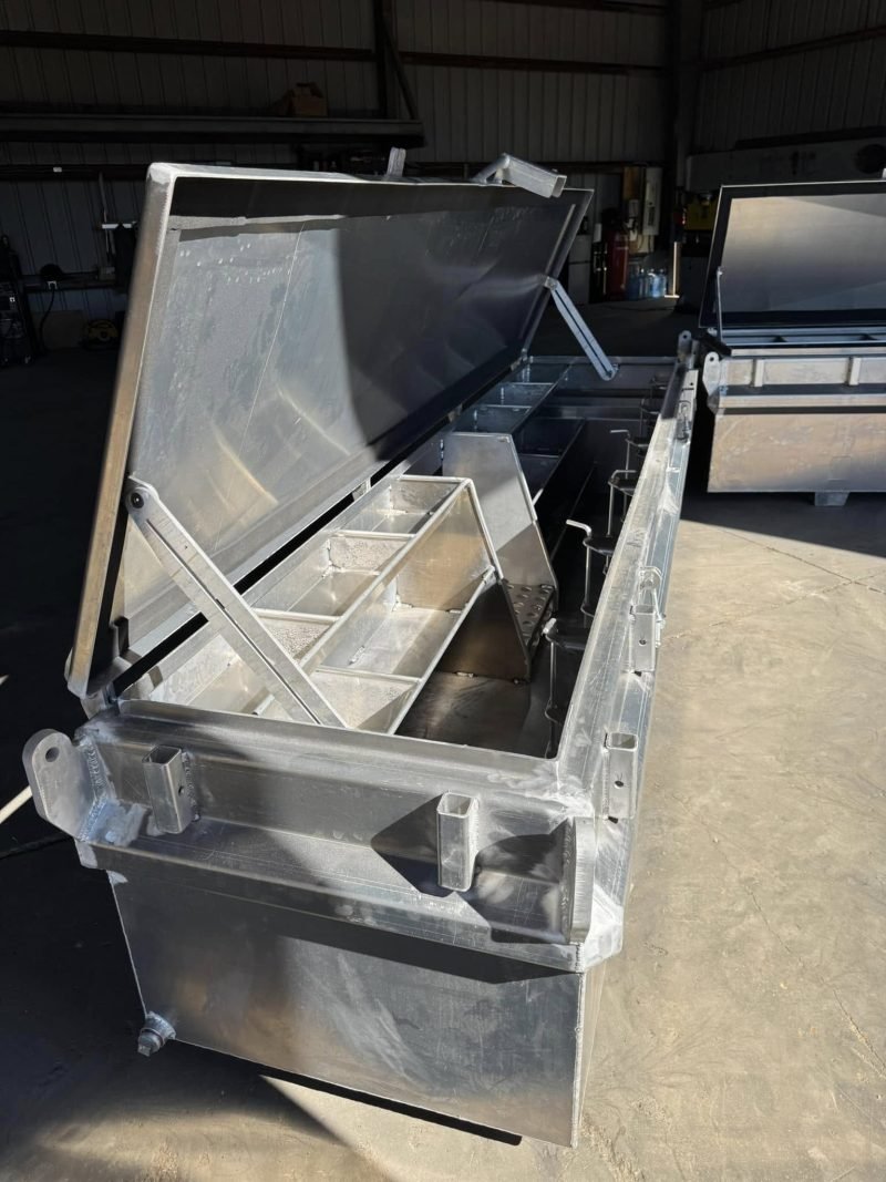 Open aluminum toolbox showing the welded interior