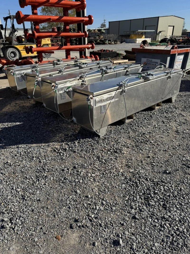 Aluminum truck toolboxes stacked in the yard