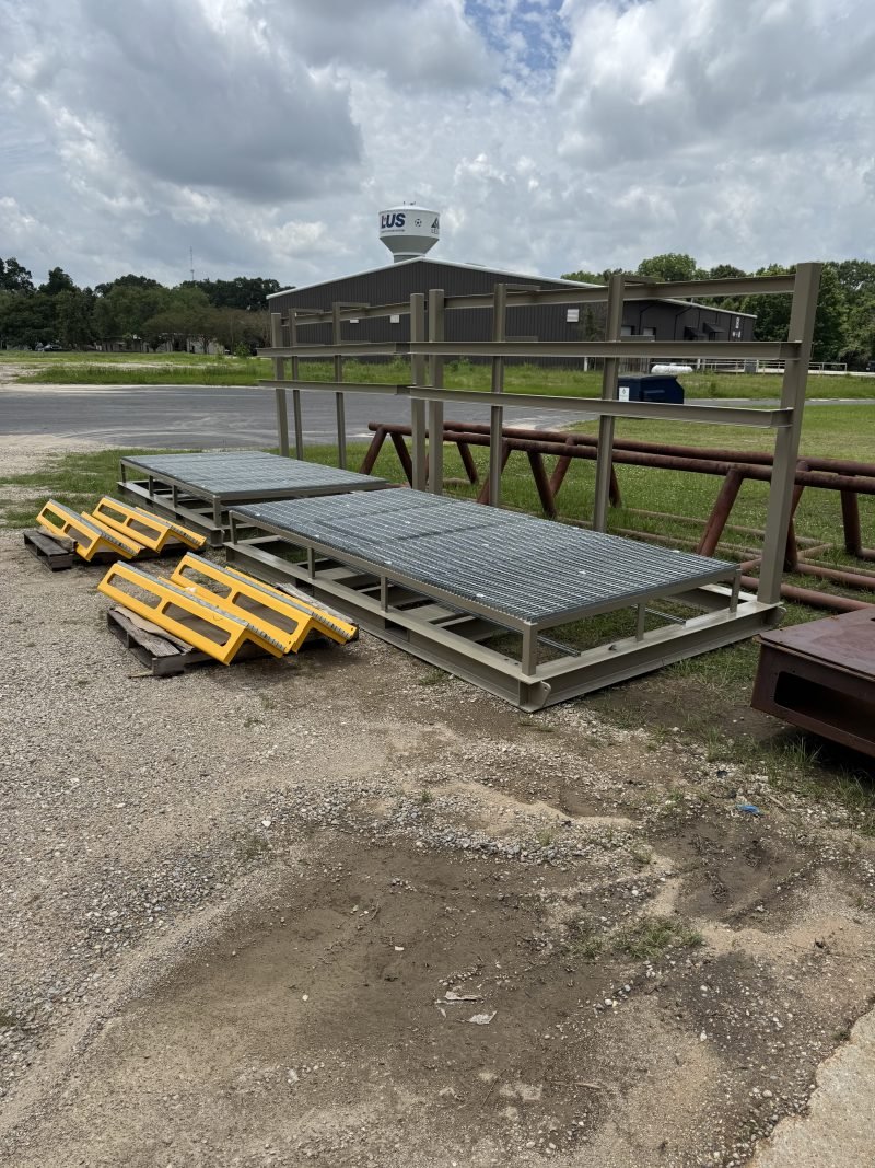 Grating platforms and frames staged in the yard