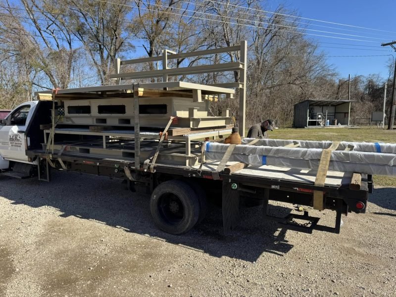 Loading welded steel frames onto a flatbed truck