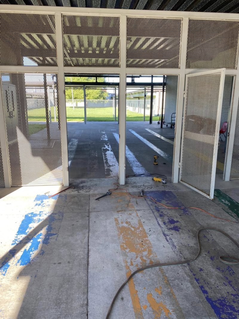 Double doors of a welded mesh security enclosure
